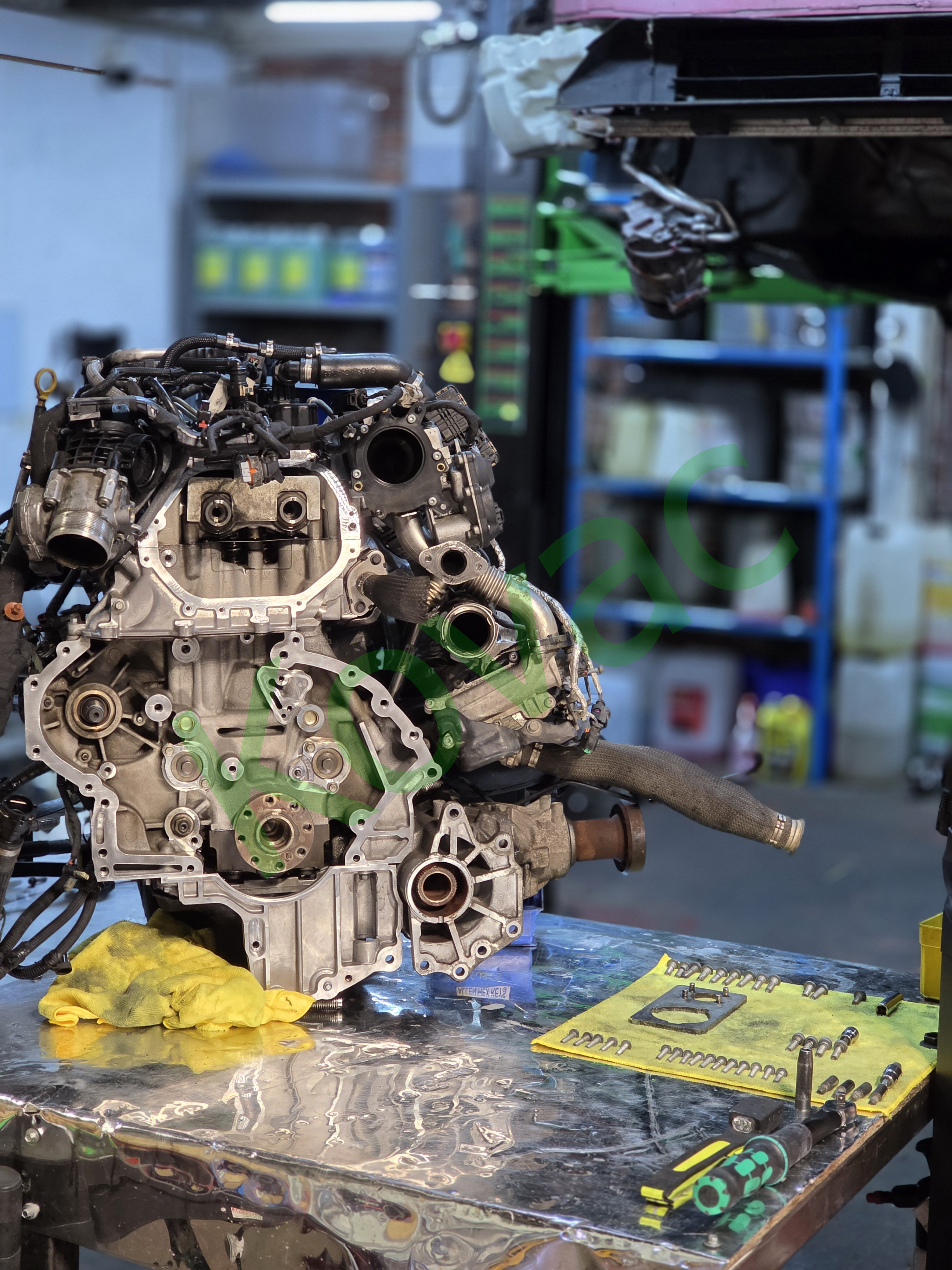 Land Rover Ingenium engine removed and prepared for timing chain replacement